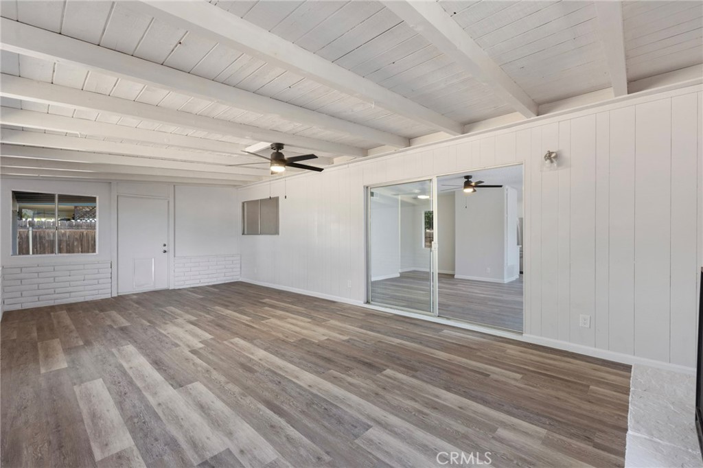 8737 Rhodes Court Santee, CA 92071 - Photo 14 of 30 a view of empty room with wooden floor and fan