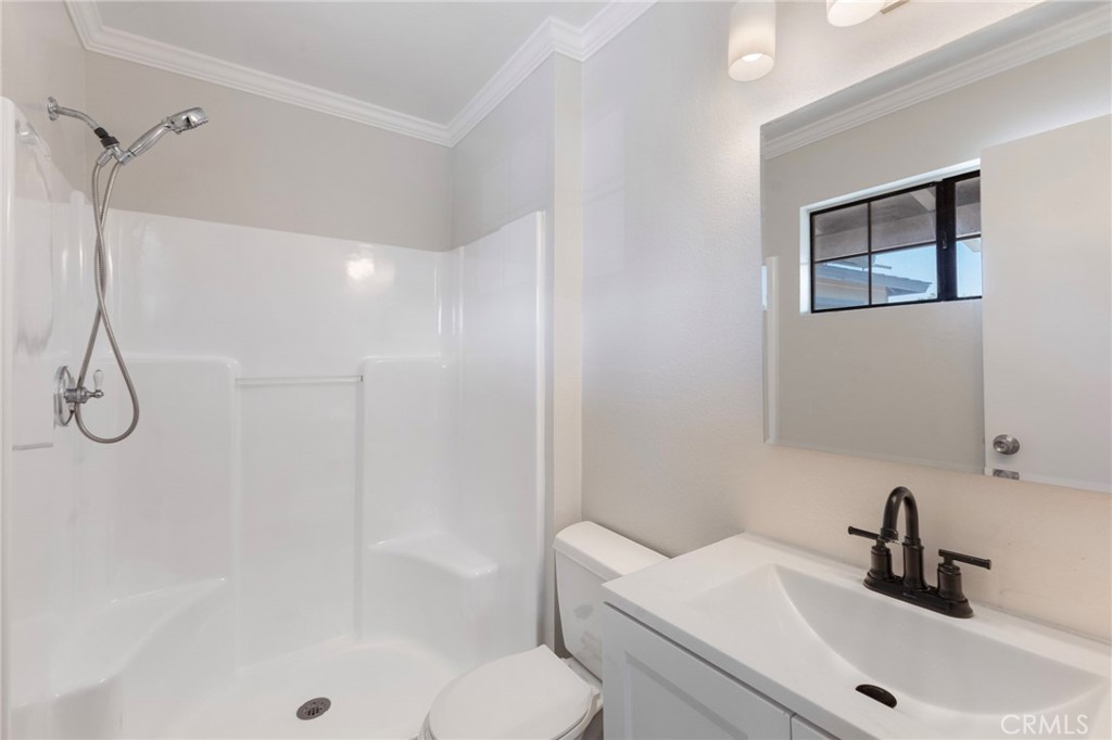 8737 Rhodes Court Santee, CA 92071 - Photo 18 of 30 a bathroom with a sink toilet and shower