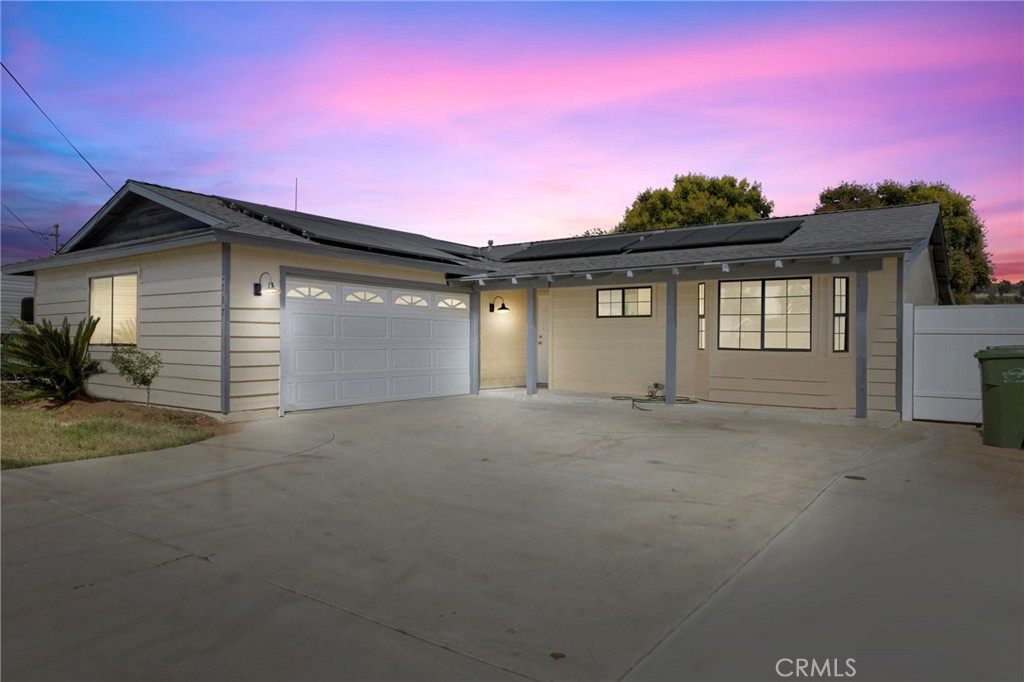 8737 Rhodes Court Santee, CA 92071 - Photo 2 of 30 a view of a house with a garage