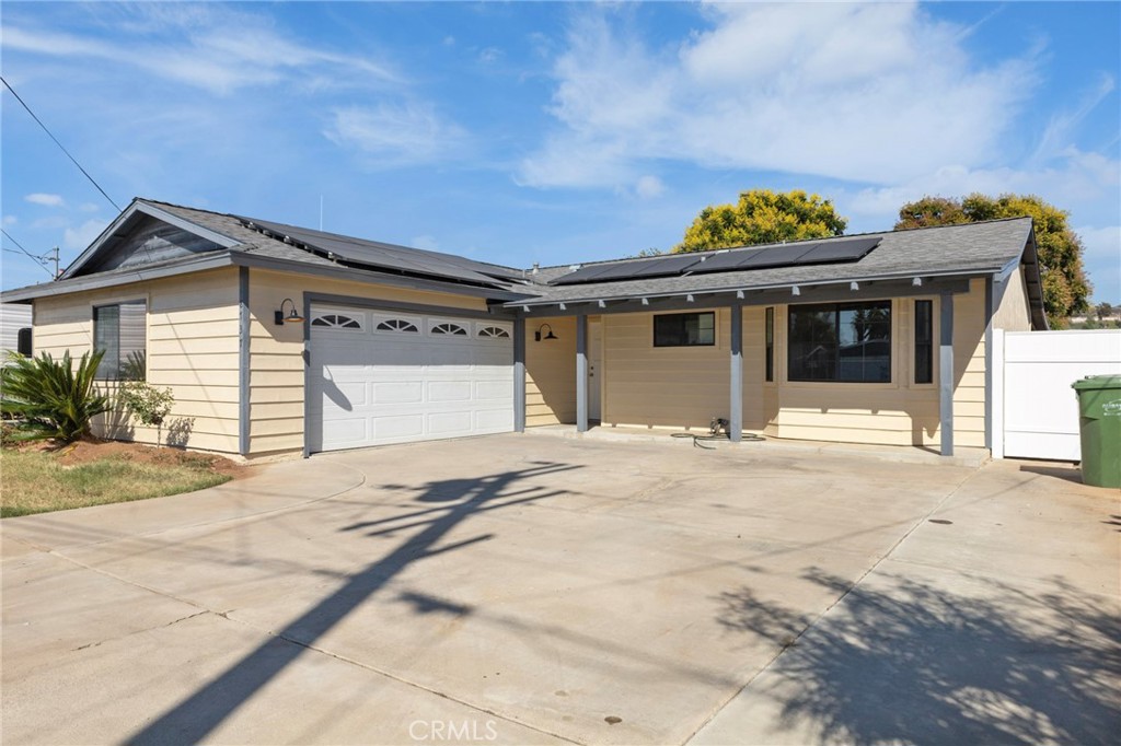 8737 Rhodes Court Santee, CA 92071 - Photo 3 of 30 a front view of a house with a garage
