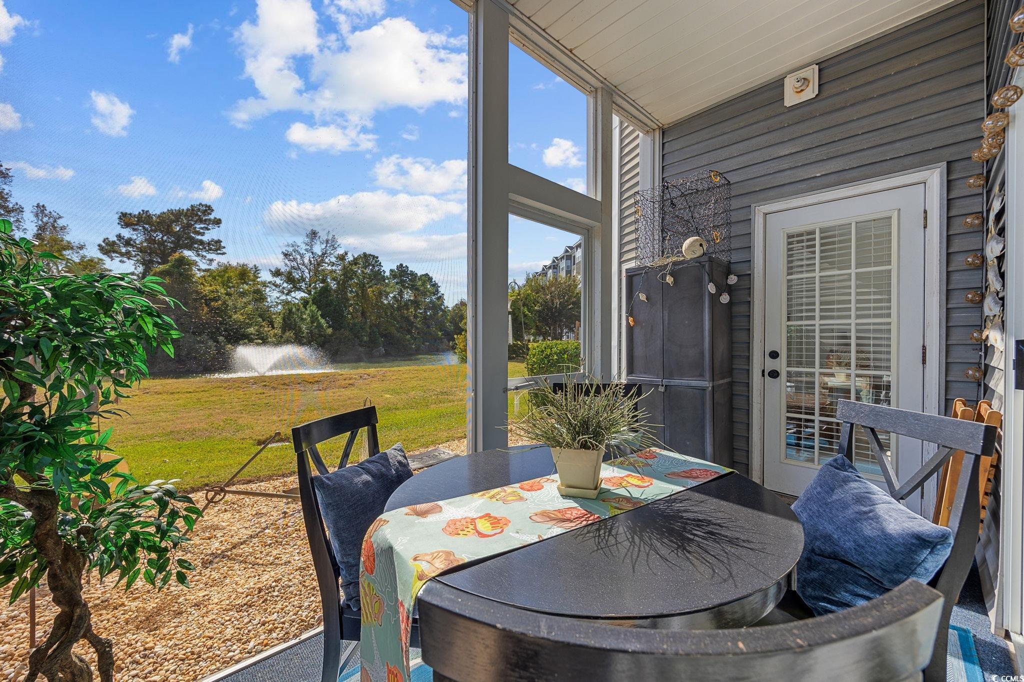 121 Waypoint Ridge Avenue, Unit P8 Little River, SC 29566 - Photo 28 of 40 Sunroom featuring a water view