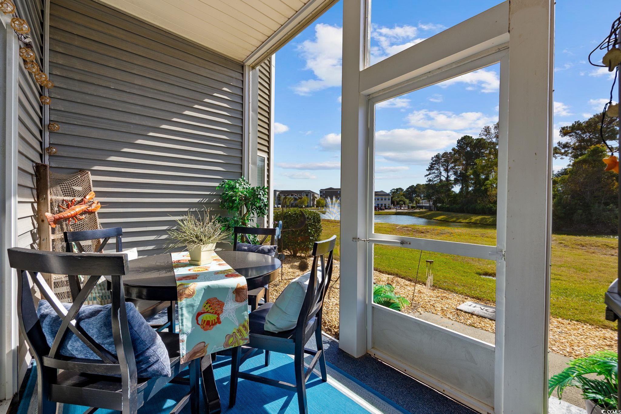 121 Waypoint Ridge Avenue, Unit P8 Little River, SC 29566 - Photo 29 of 40 Sunroom with a water view