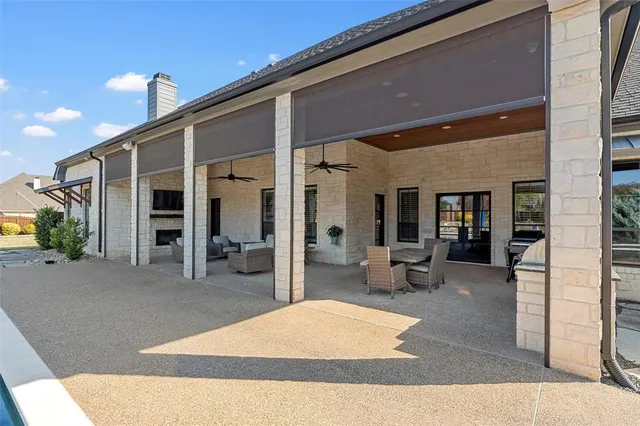 a building exterior with furniture