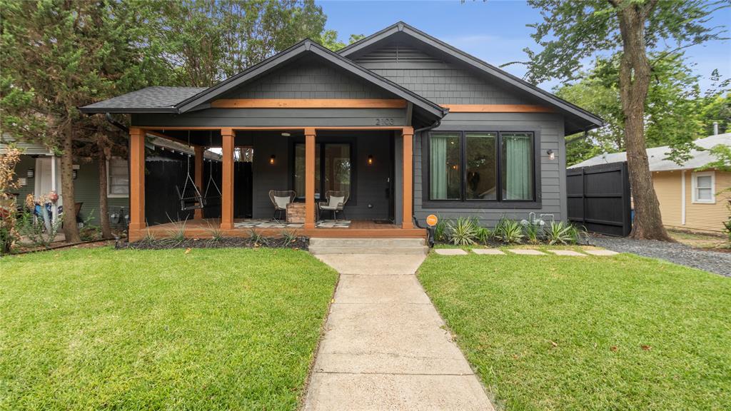 2103 Madera Street Dallas, TX 75206 - Photo 1 of 1 front view of a house with a yard