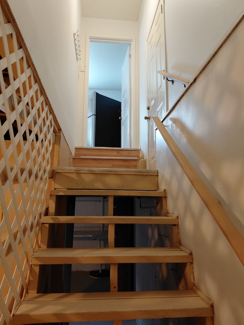2231 West Cheyenne Road Waukegan, IL 60087 - Photo 11 of 21 a view of entryway and hall with wooden floor
