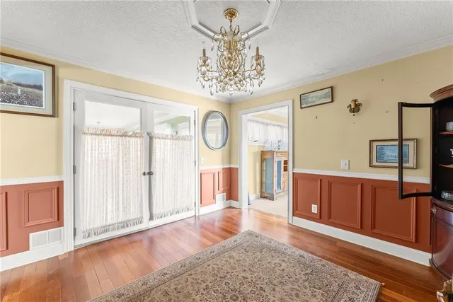 a open kitchen with stainless steel appliances granite countertop a stove and refrigerator