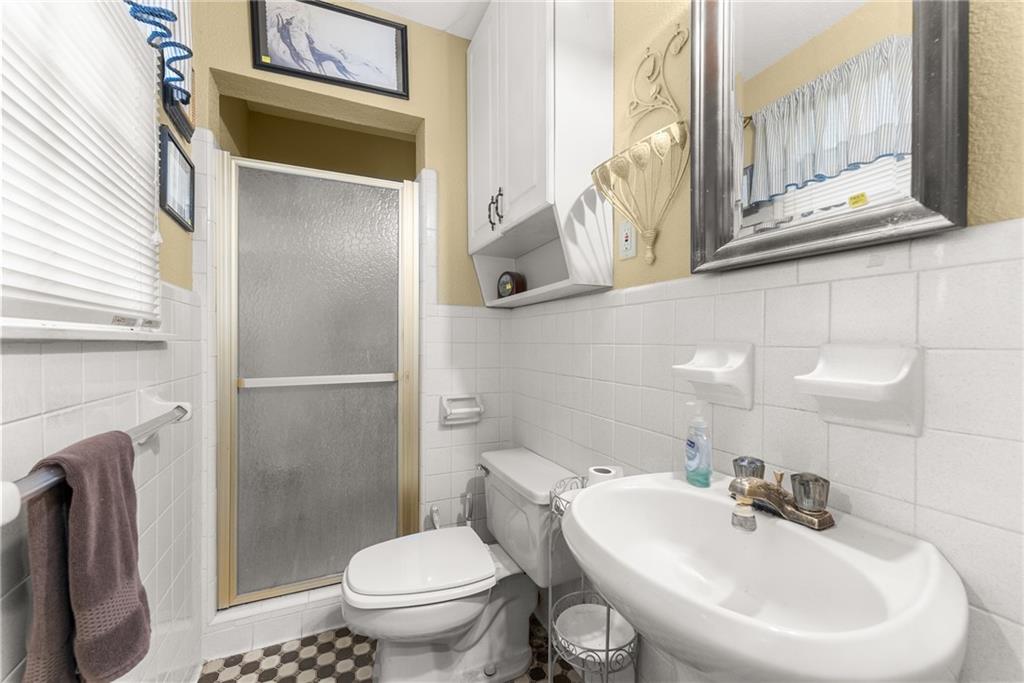 387 Smoke Rise Drive Sautee Nacoochee, GA 30571 - Photo 20 of 79 a bathroom with a sink mirror and toilet