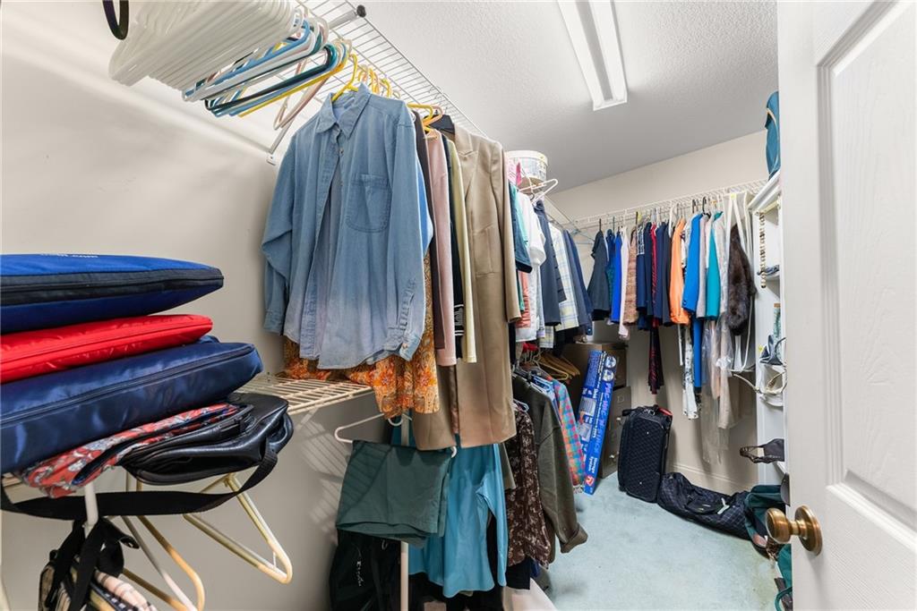 387 Smoke Rise Drive Sautee Nacoochee, GA 30571 - Photo 30 of 79 a view of walk in closet with clothes