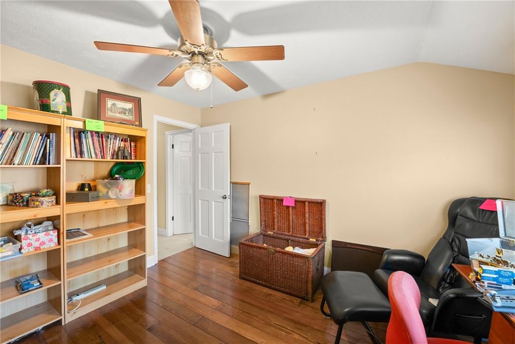 387 Smoke Rise Drive Sautee Nacoochee, GA 30571 - Photo 35 of 79 a living room with furniture and a book shelf