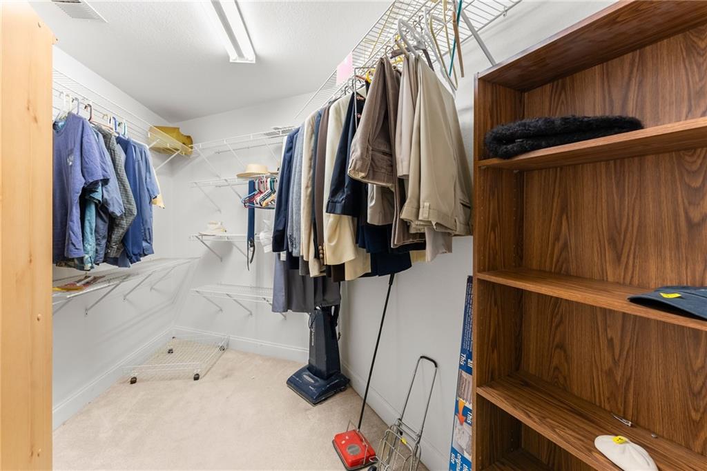 387 Smoke Rise Drive Sautee Nacoochee, GA 30571 - Photo 36 of 79 a view of walk in closet with clothes and shoes
