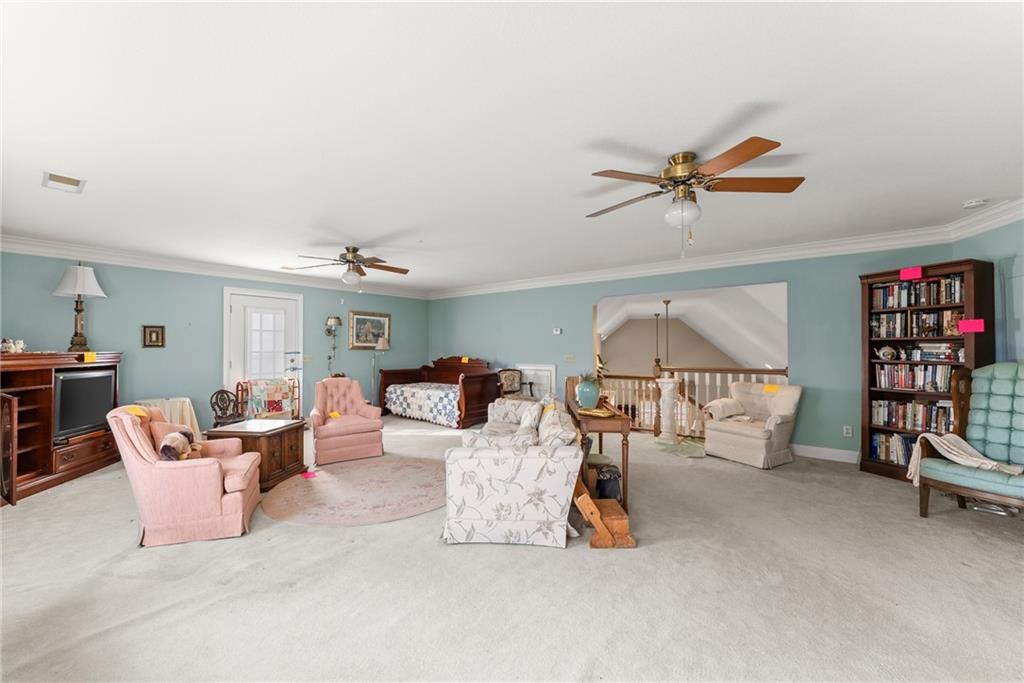 387 Smoke Rise Drive Sautee Nacoochee, GA 30571 - Photo 39 of 79 a living room with furniture and a chandelier