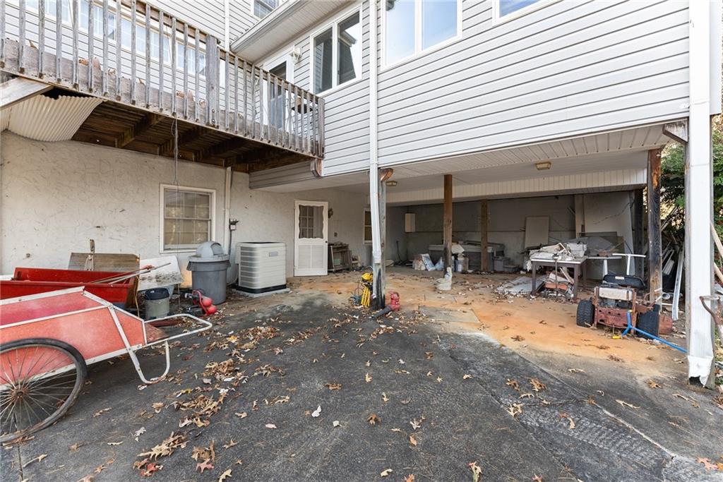 387 Smoke Rise Drive Sautee Nacoochee, GA 30571 - Photo 48 of 79 a view of a patio with table and chairs and potted plants