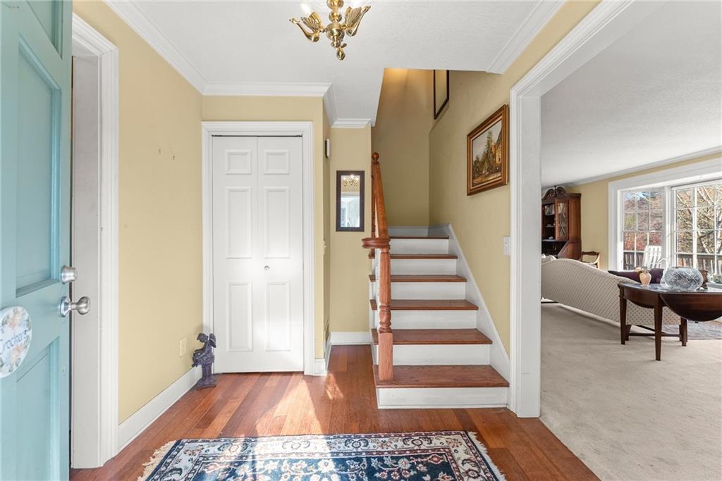 387 Smoke Rise Drive Sautee Nacoochee, GA 30571 - Photo 7 of 79 a view of a hallway view with floor to ceiling window and wooden floor