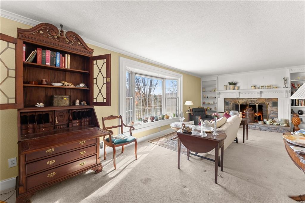 387 Smoke Rise Drive Sautee Nacoochee, GA 30571 - Photo 10 of 79 a living room with furniture and a book shelf