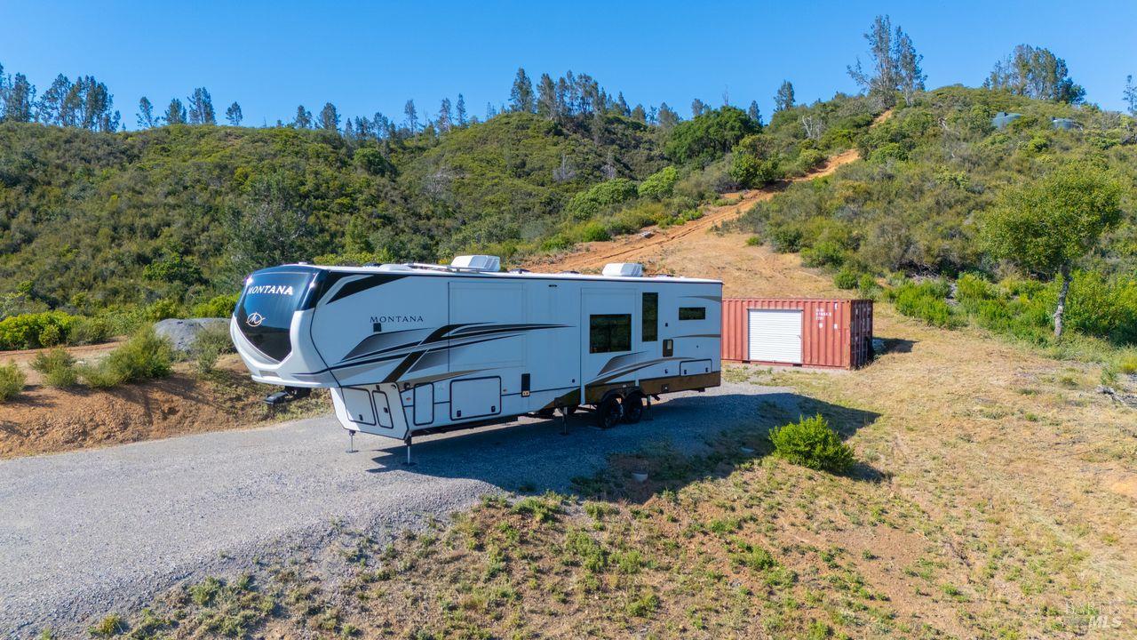 31909 Green Road Cloverdale, CA 95425 - Photo 5 of 25 a view of a house with a yard