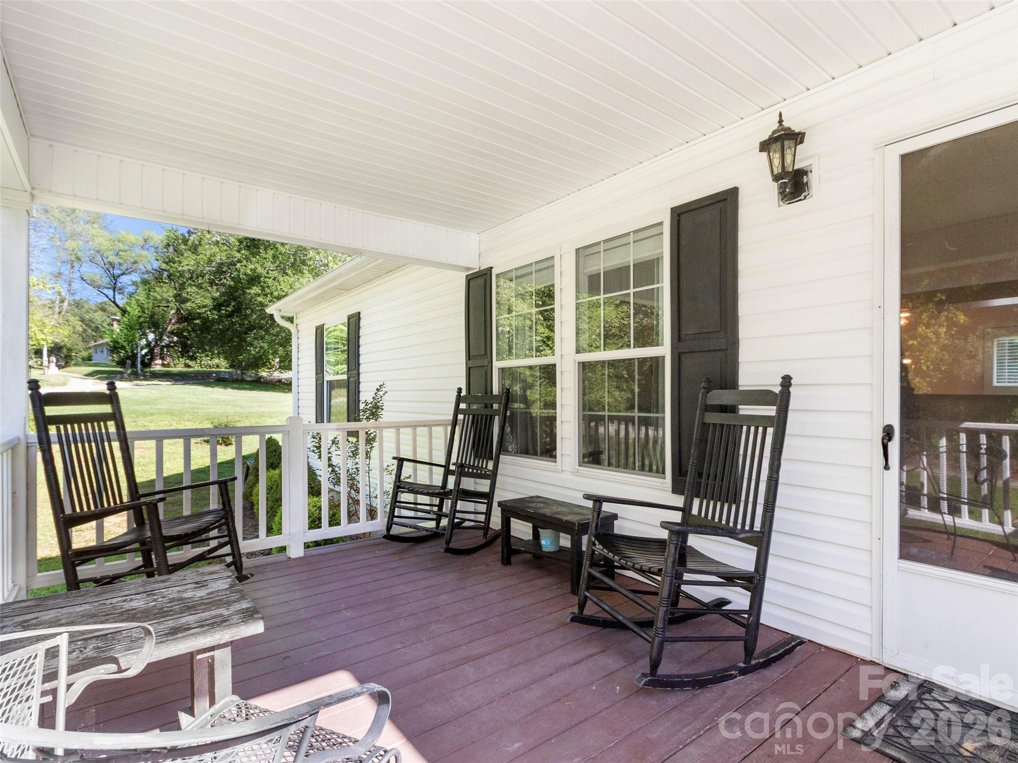 9 Sun Ridge Road Asheville, NC 28806 - Photo 19 of 29 a living room with furniture and a window