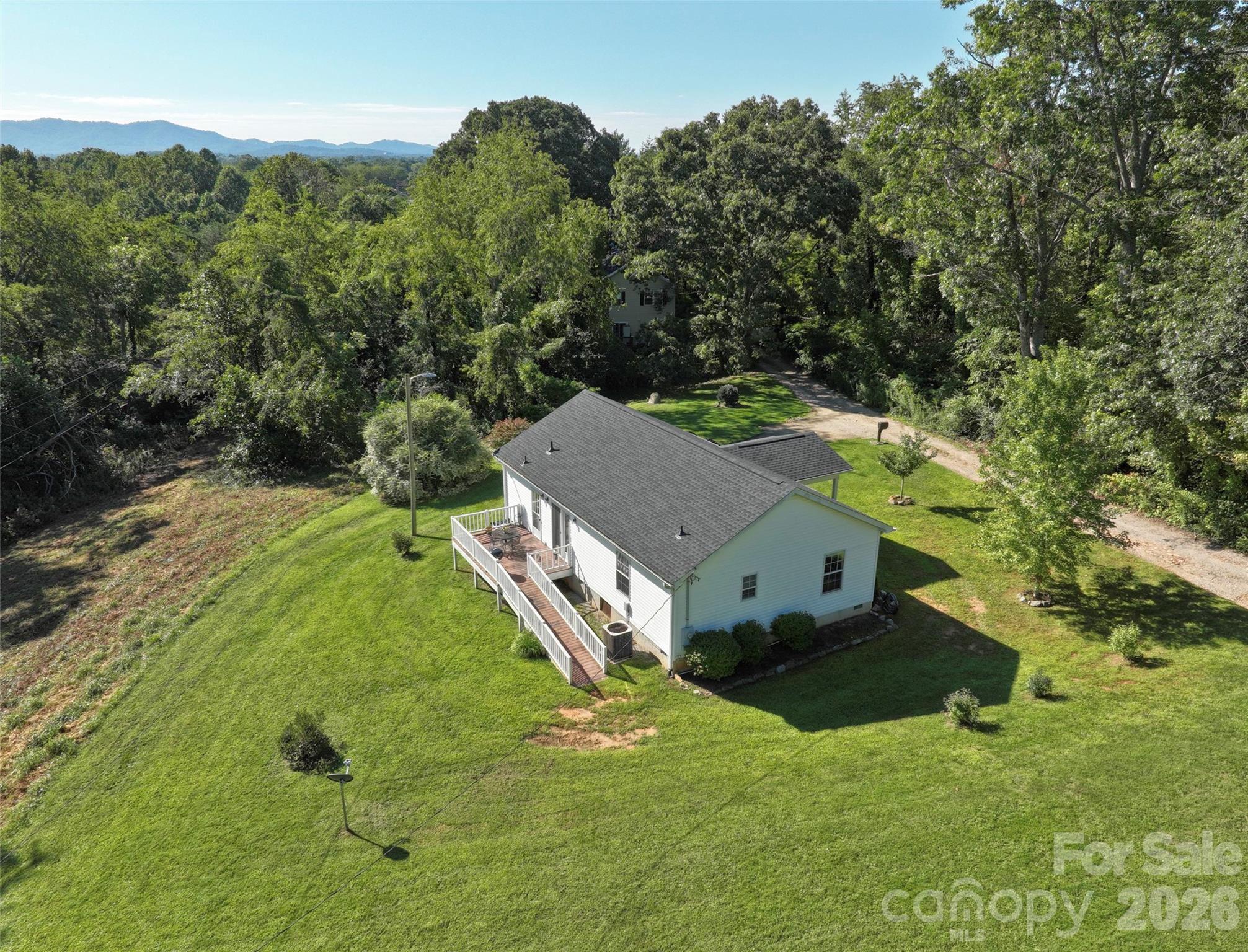 9 Sun Ridge Road Asheville, NC 28806 - Photo 2 of 29 a view of a house with a yard