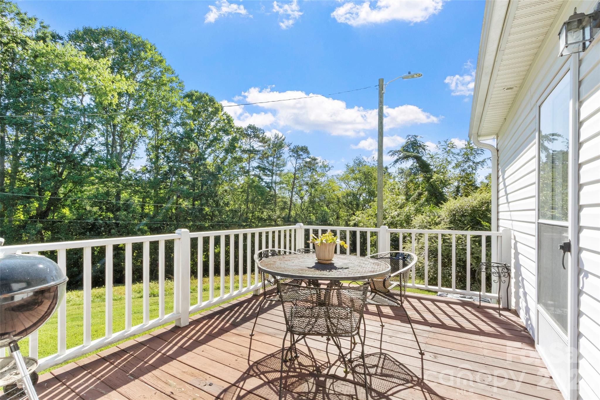 9 Sun Ridge Road Asheville, NC 28806 - Photo 21 of 29 a view of a balcony with wooden floor