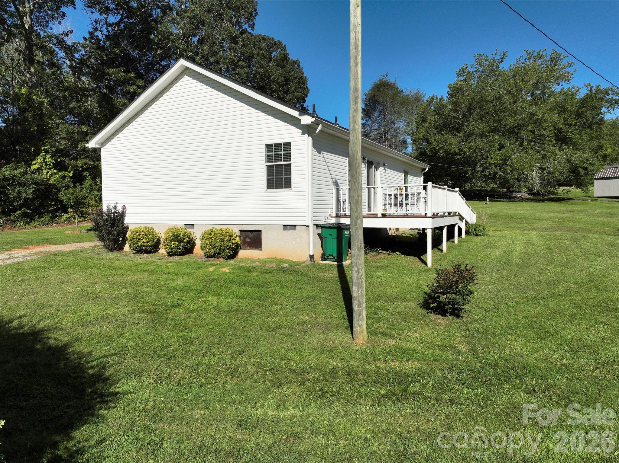 9 Sun Ridge Road Asheville, NC 28806 - Photo 23 of 29 a view of a house with a backyard