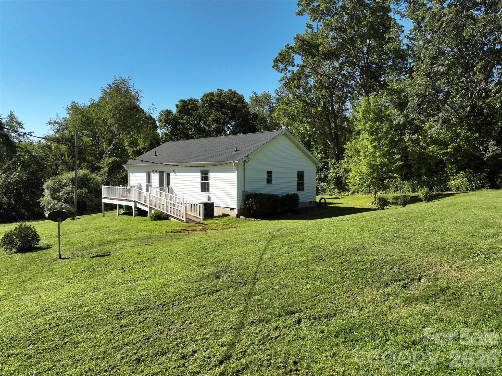 9 Sun Ridge Road Asheville, NC 28806 - Photo 24 of 29 a view of a house with a yard