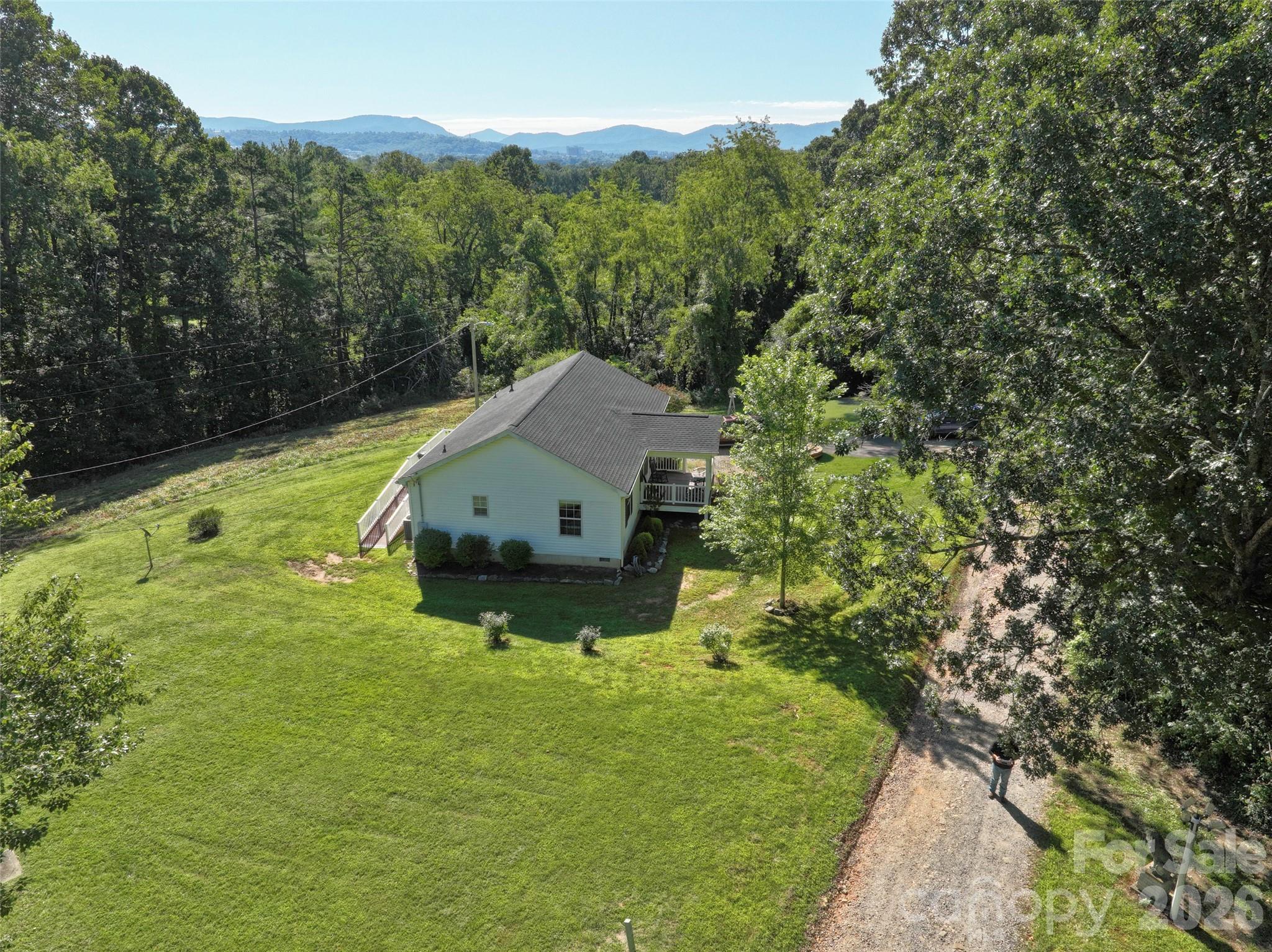 9 Sun Ridge Road Asheville, NC 28806 - Photo 26 of 29 a house view with a garden space