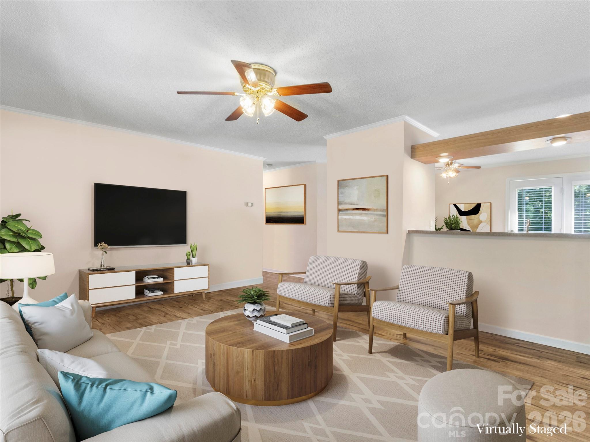 9 Sun Ridge Road Asheville, NC 28806 - Photo 5 of 29 a living room with furniture and a flat screen tv