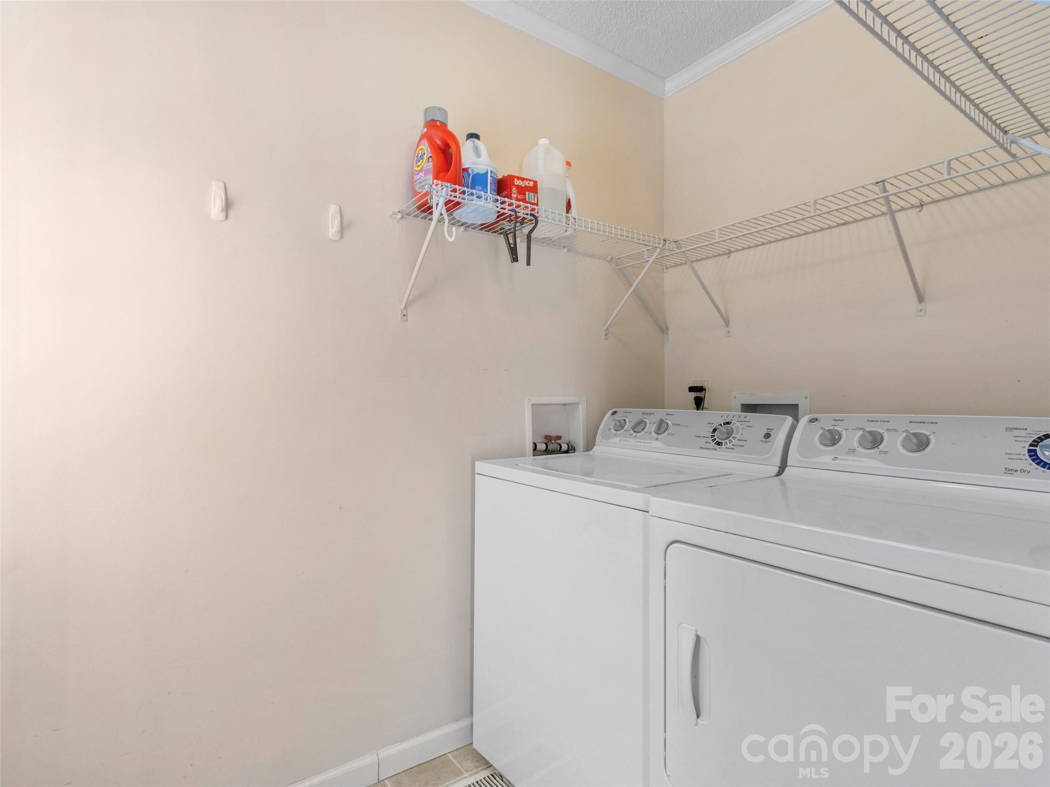 9 Sun Ridge Road Asheville, NC 28806 - Photo 10 of 29 a utility room with dryer and washer