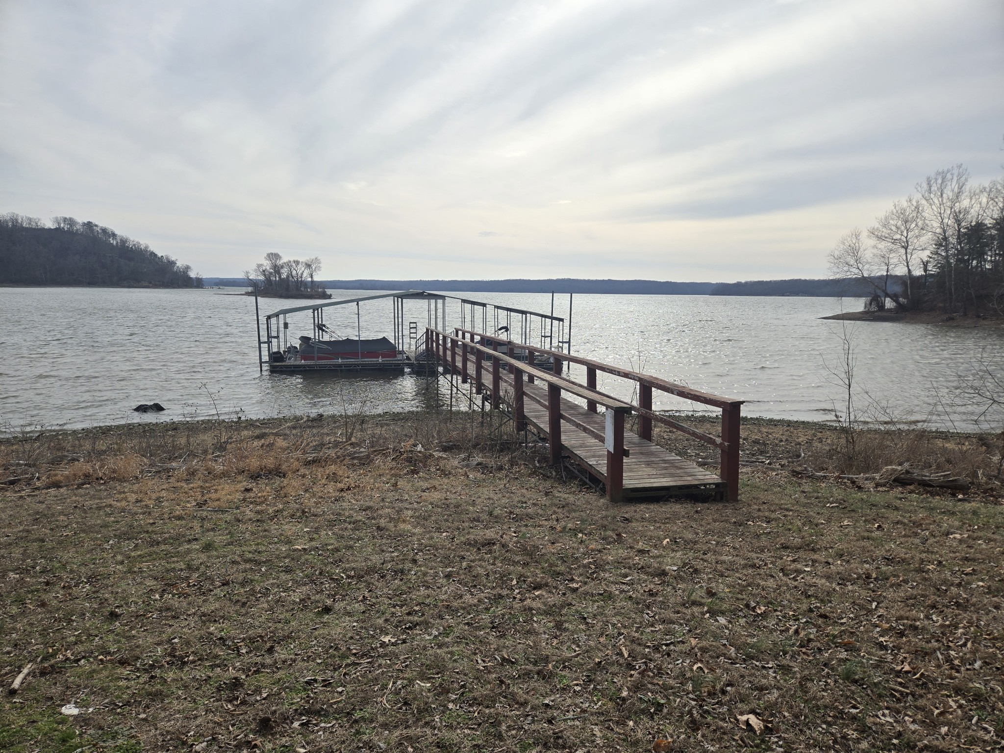 0 Cleburne Point Waverly, TN 37185 - Photo 2 of 11 a view of a lake with a terrace