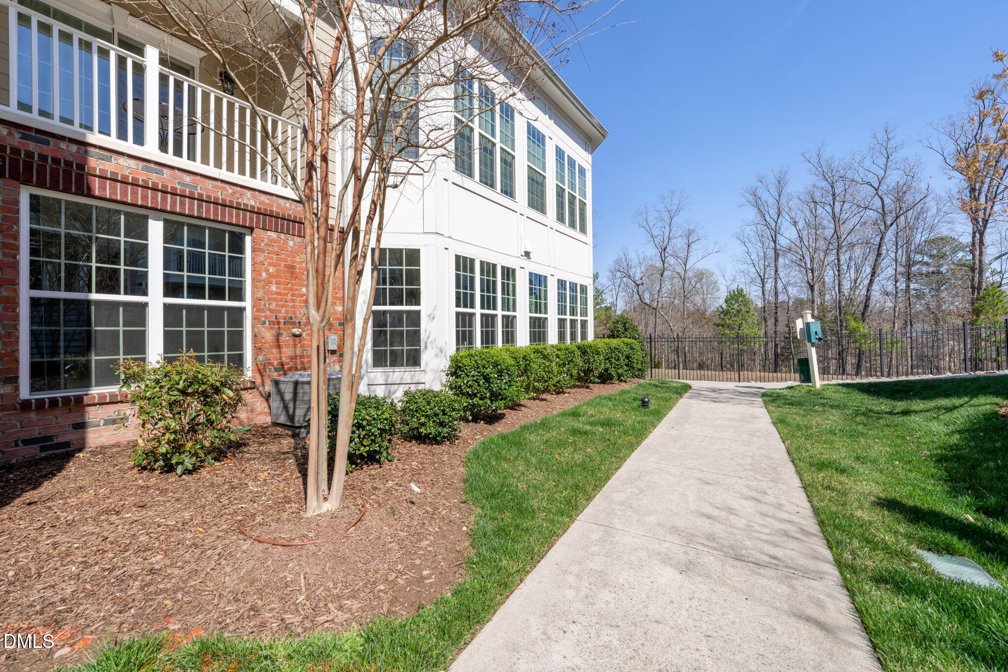 10320 Sablewood Drive, Unit 108 Raleigh, NC 27617 - Photo 24 of 34 a front view of a house with garden