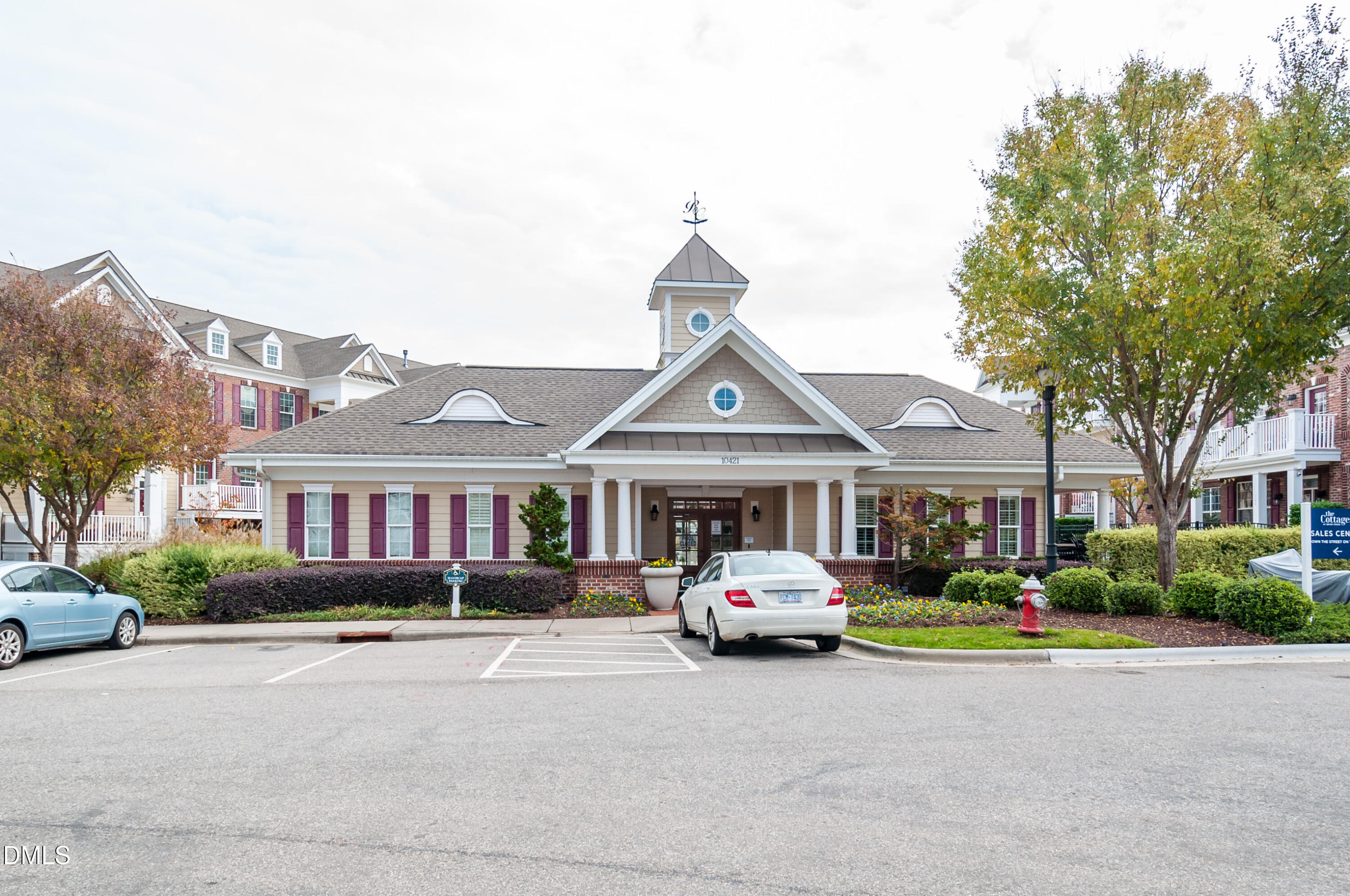 10320 Sablewood Drive, Unit 108 Raleigh, NC 27617 - Photo 31 of 34 a car parked in front of house with large trees