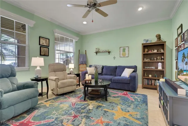 a living room with furniture and a rug