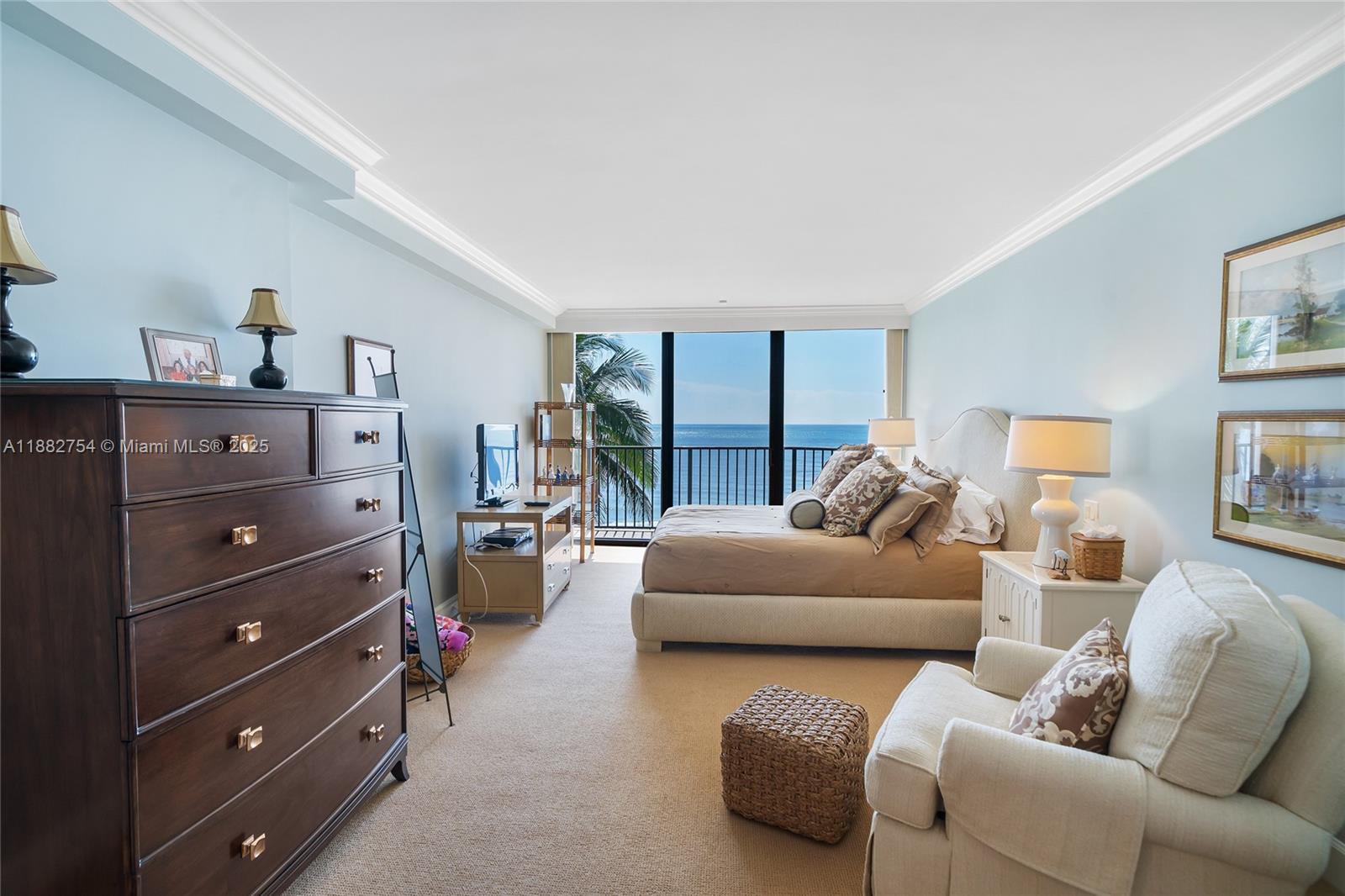 200 South Beach Road, Unit 202 Tequesta, FL 33469 - Photo 17 of 45 a living room with furniture and a window