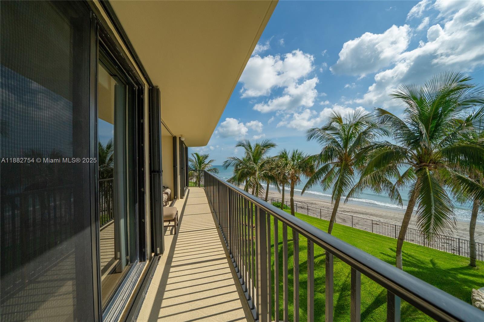 200 South Beach Road, Unit 202 Tequesta, FL 33469 - Photo 35 of 45 a view of balcony with wooden floor