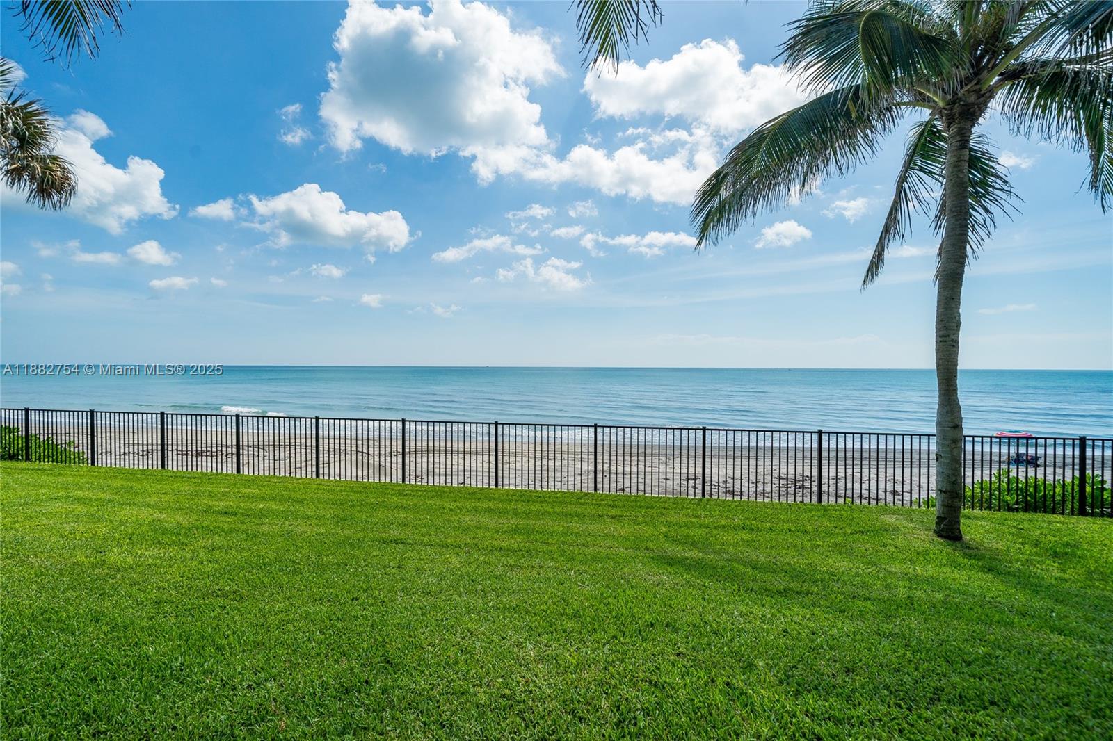 200 South Beach Road, Unit 202 Tequesta, FL 33469 - Photo 41 of 45 a view of an ocean with a big yard