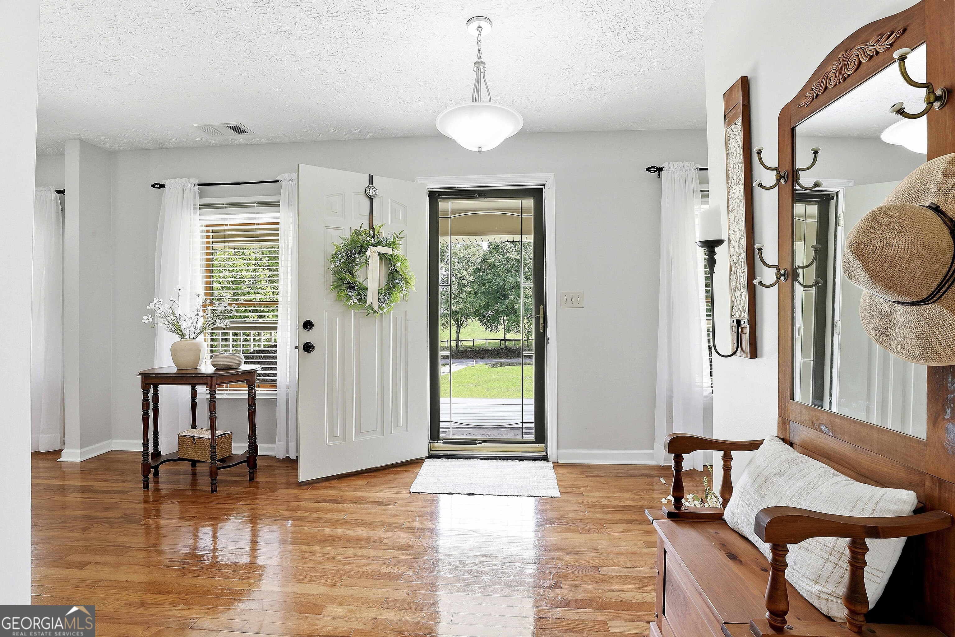 222 Lincoln Road Tyrone, GA 30290 - Photo 11 of 65 looking front great room toward the front door