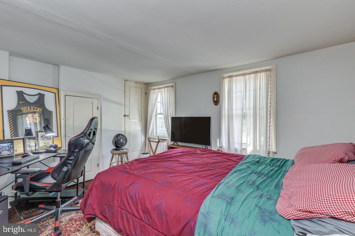 15 East 2nd Street Moorestown, NJ 08057 - Photo 14 of 52 a bedroom with a bed and wooden floor