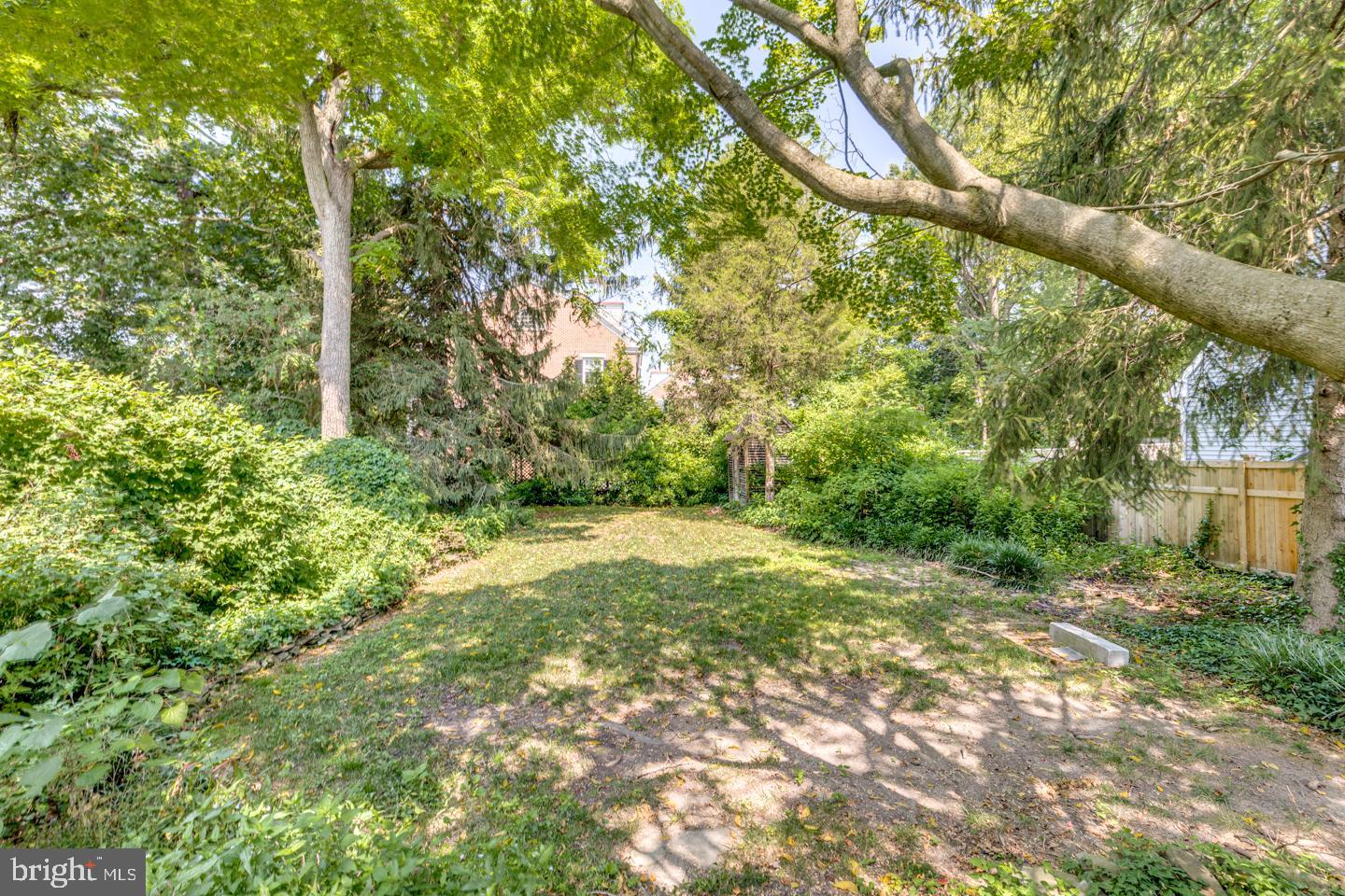 15 East 2nd Street Moorestown, NJ 08057 - Photo 19 of 52 a view of a yard with plants and trees