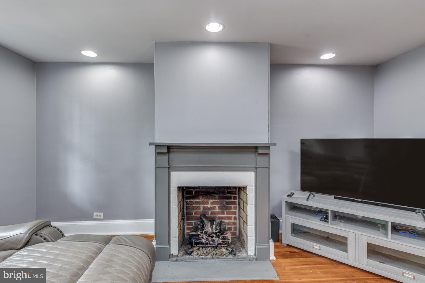 15 East 2nd Street Moorestown, NJ 08057 - Photo 24 of 52 a living room with furniture and a flat screen tv