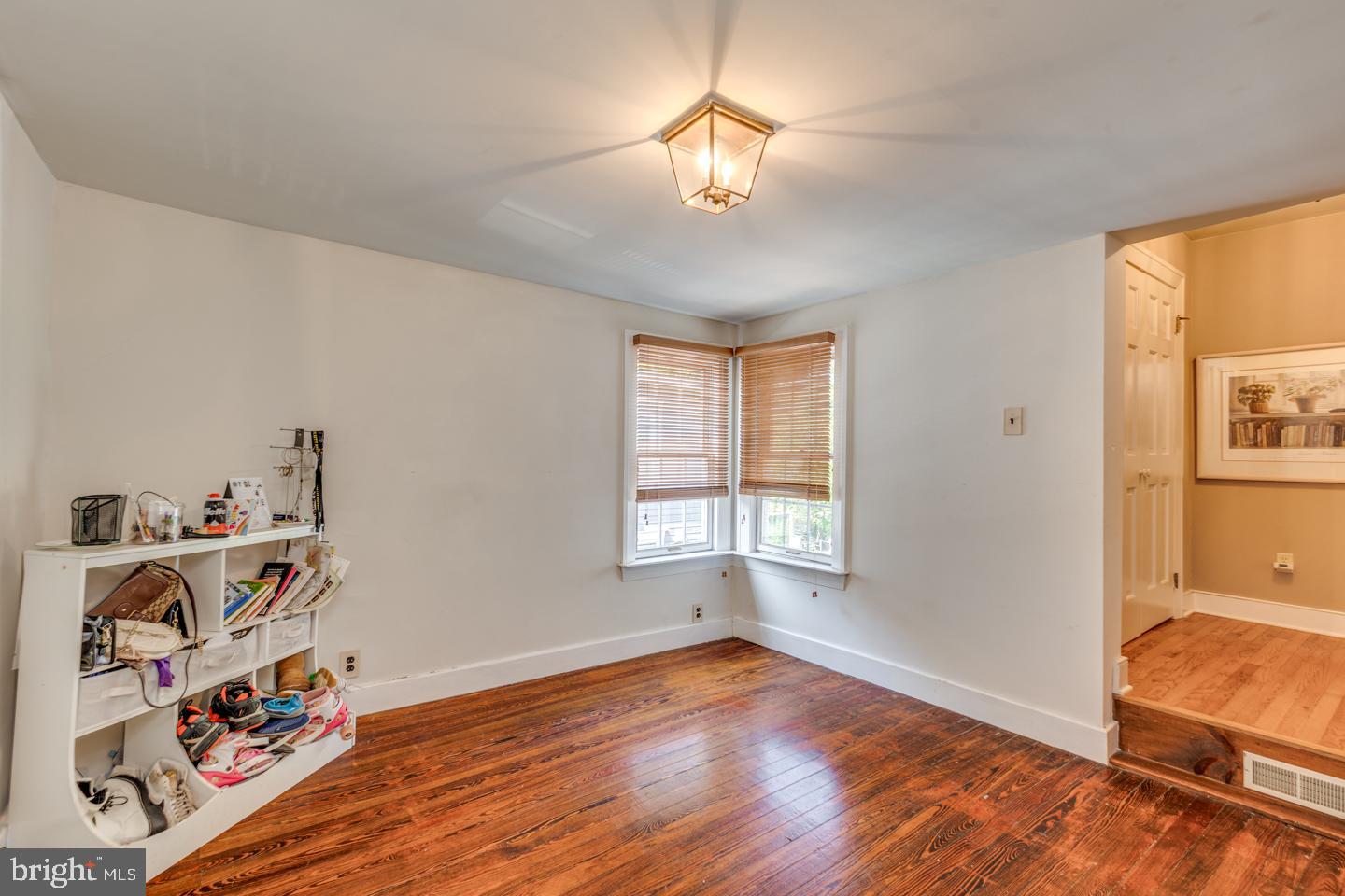 15 East 2nd Street Moorestown, NJ 08057 - Photo 33 of 52 a view of a livingroom with wooden floor and a window