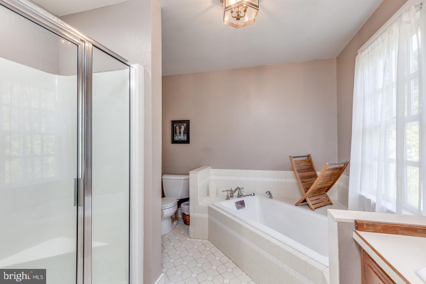 15 East 2nd Street Moorestown, NJ 08057 - Photo 40 of 52 a bathroom with a tub and a view of bathroom