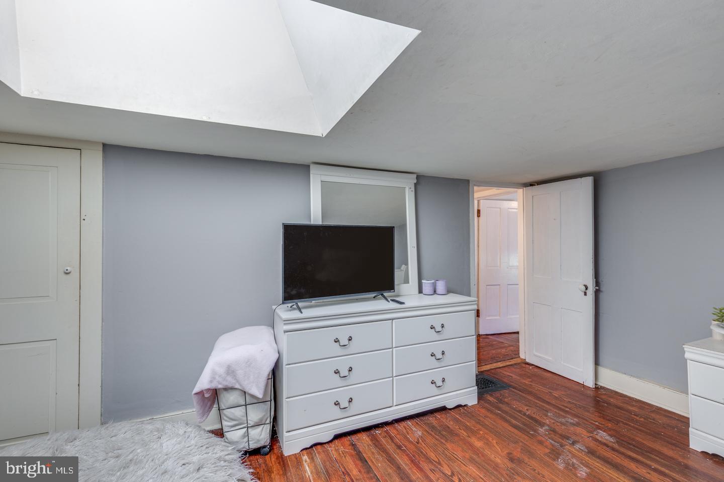 15 East 2nd Street Moorestown, NJ 08057 - Photo 43 of 52 a room with furniture and flat screen tv