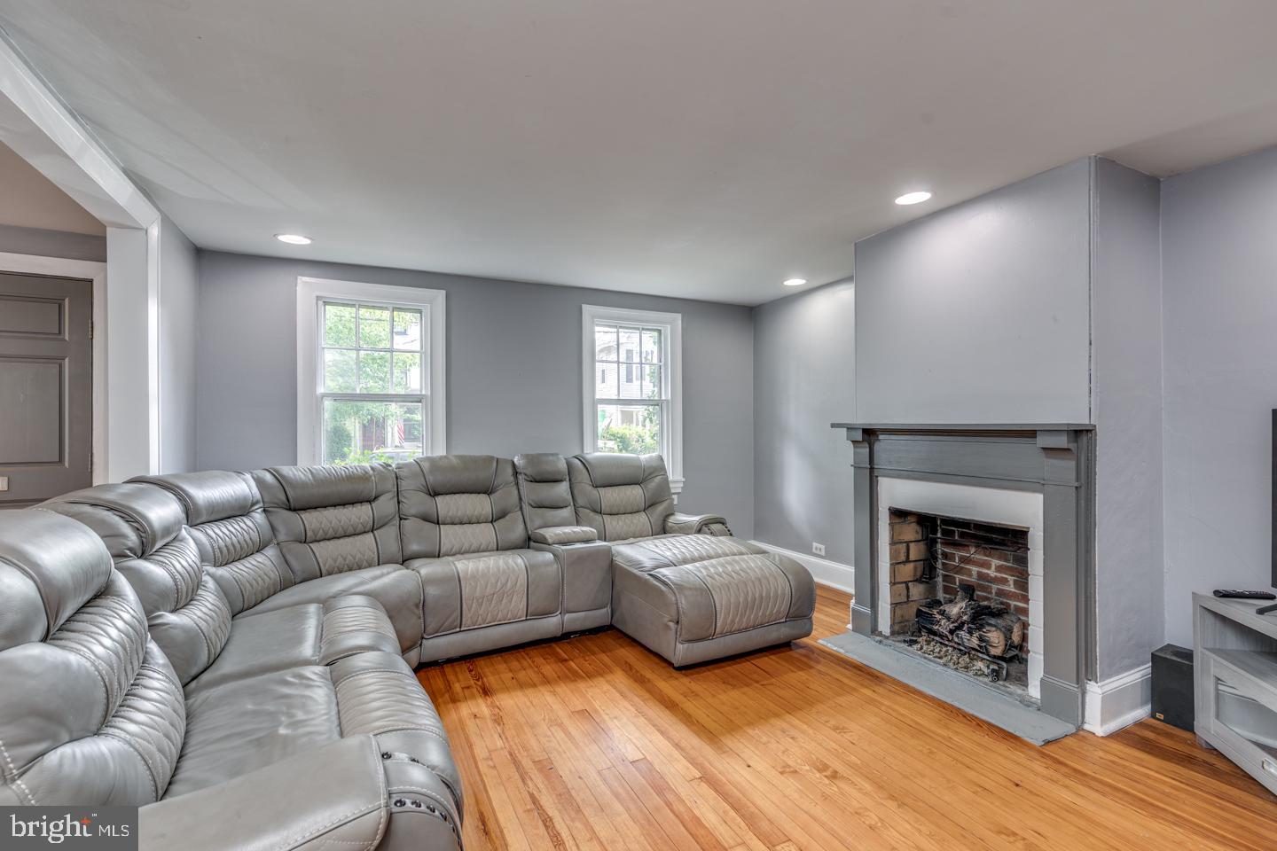 15 East 2nd Street Moorestown, NJ 08057 - Photo 52 of 52 a living room with furniture and a fireplace