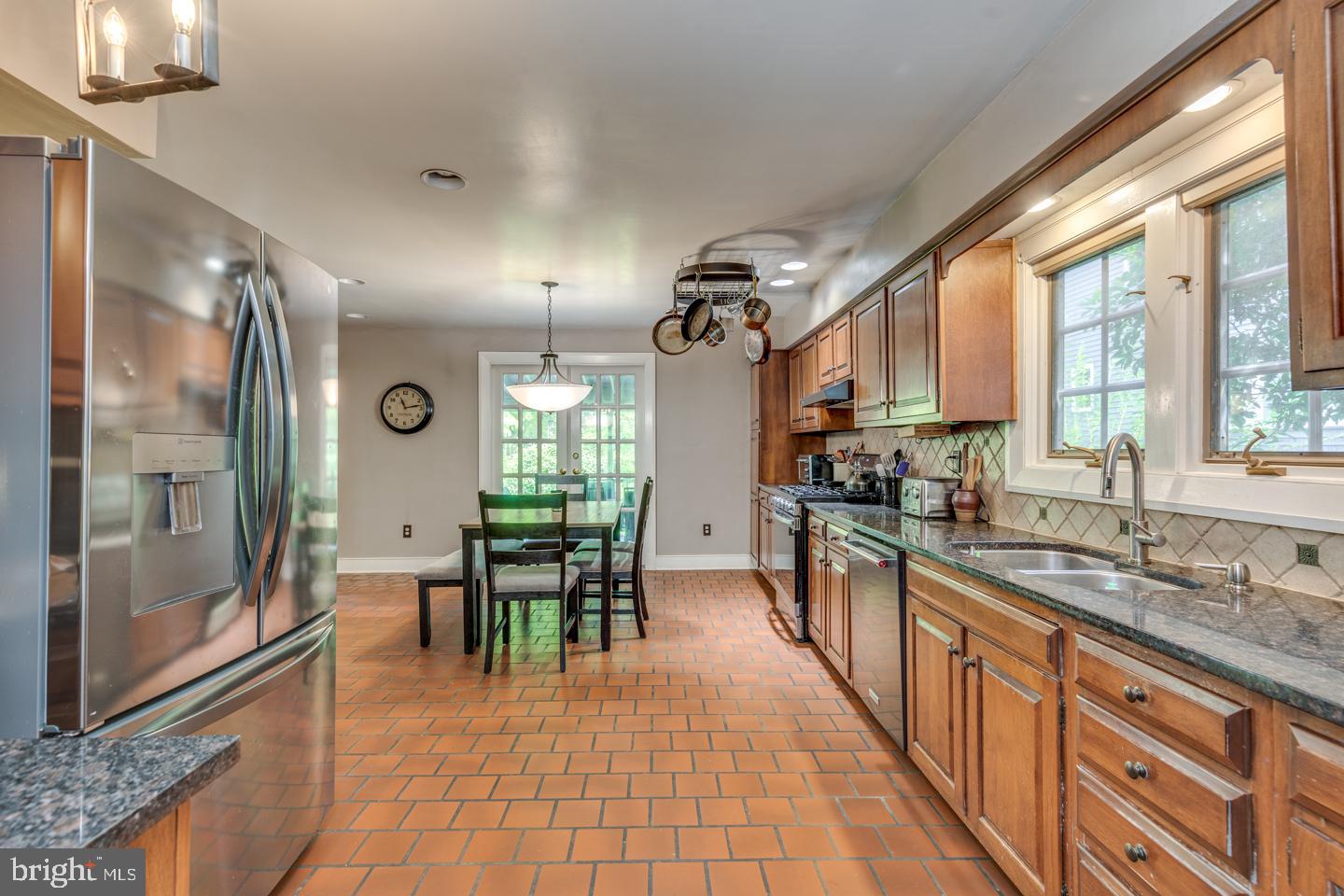 15 East 2nd Street Moorestown, NJ 08057 - Photo 8 of 52 a large kitchen with granite countertop a large window and a counter space