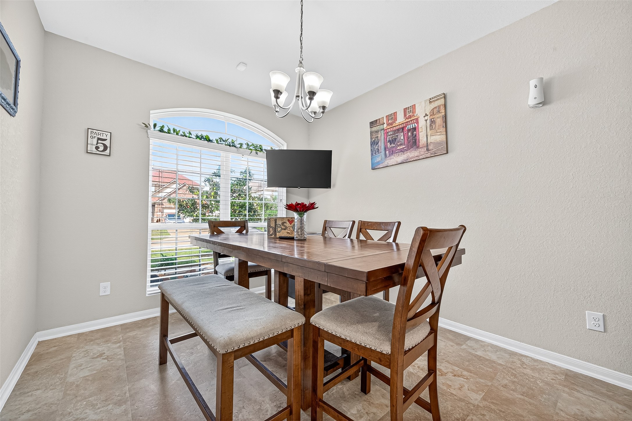 2611 Cottage Step Trail Fresno, TX 77545 - Photo 21 of 48 a view of a dining room with furniture and a chandelier