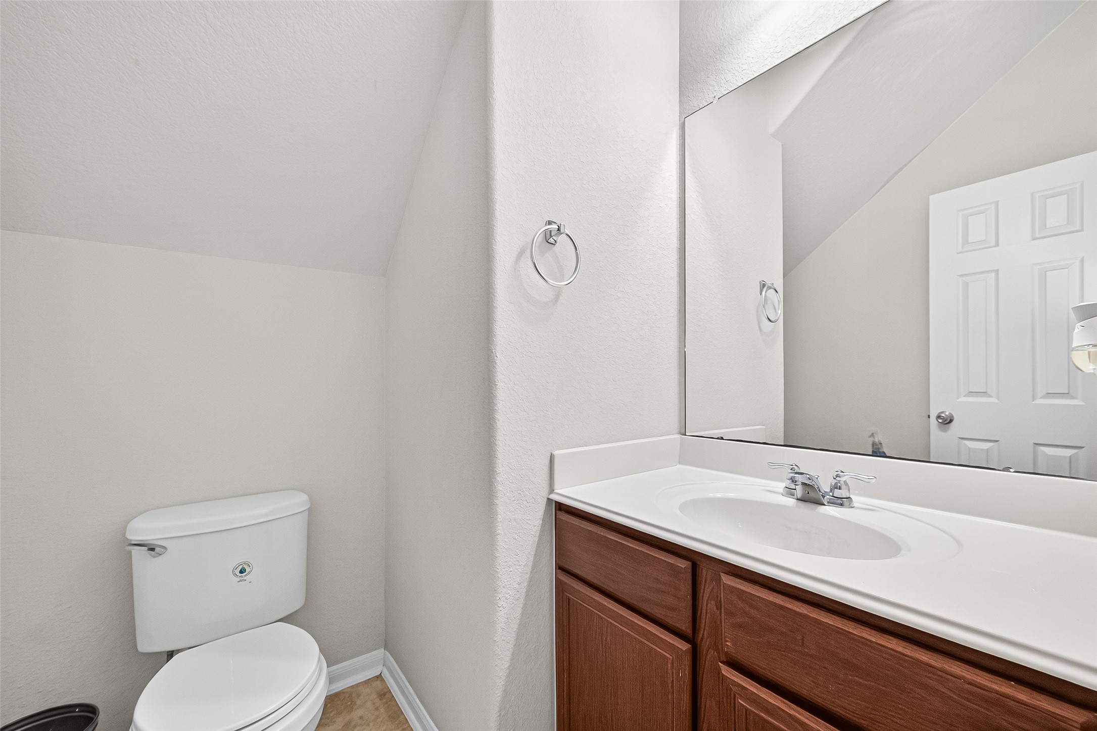 2611 Cottage Step Trail Fresno, TX 77545 - Photo 22 of 48 a bathroom with a toilet a sink and mirror