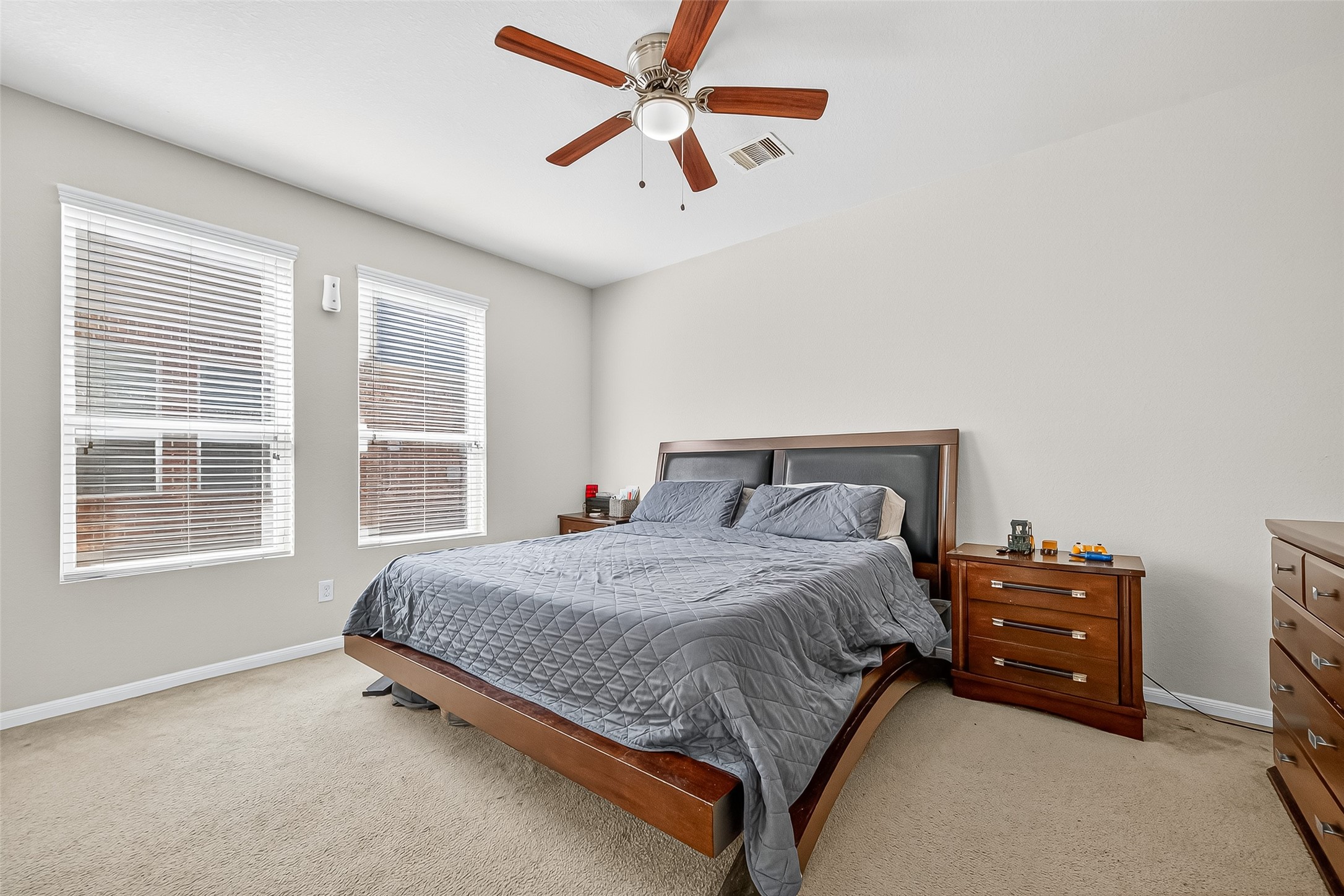 2611 Cottage Step Trail Fresno, TX 77545 - Photo 23 of 48 a bedroom with a bed dresser and a window