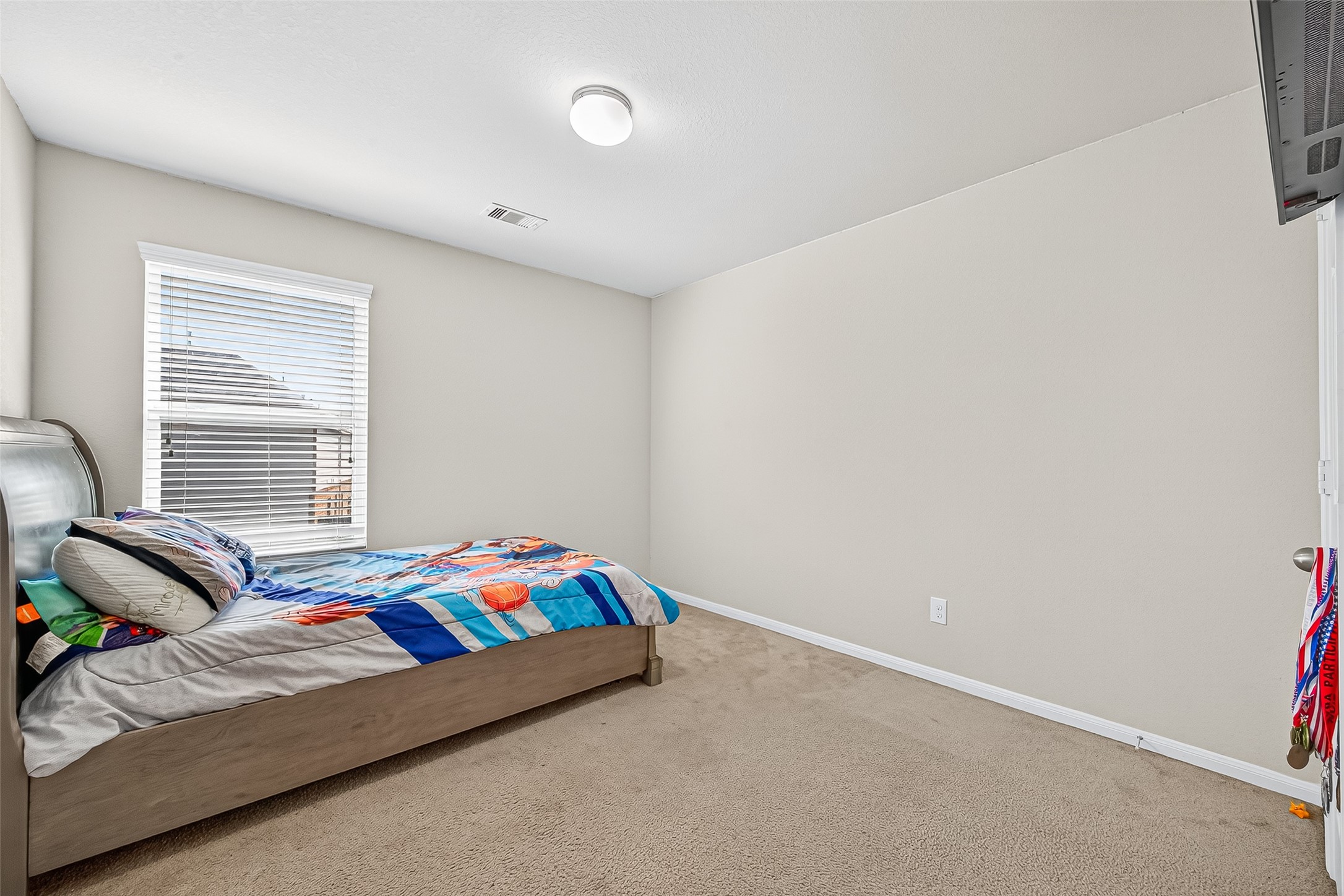 2611 Cottage Step Trail Fresno, TX 77545 - Photo 41 of 48 a bedroom with a bed and a window