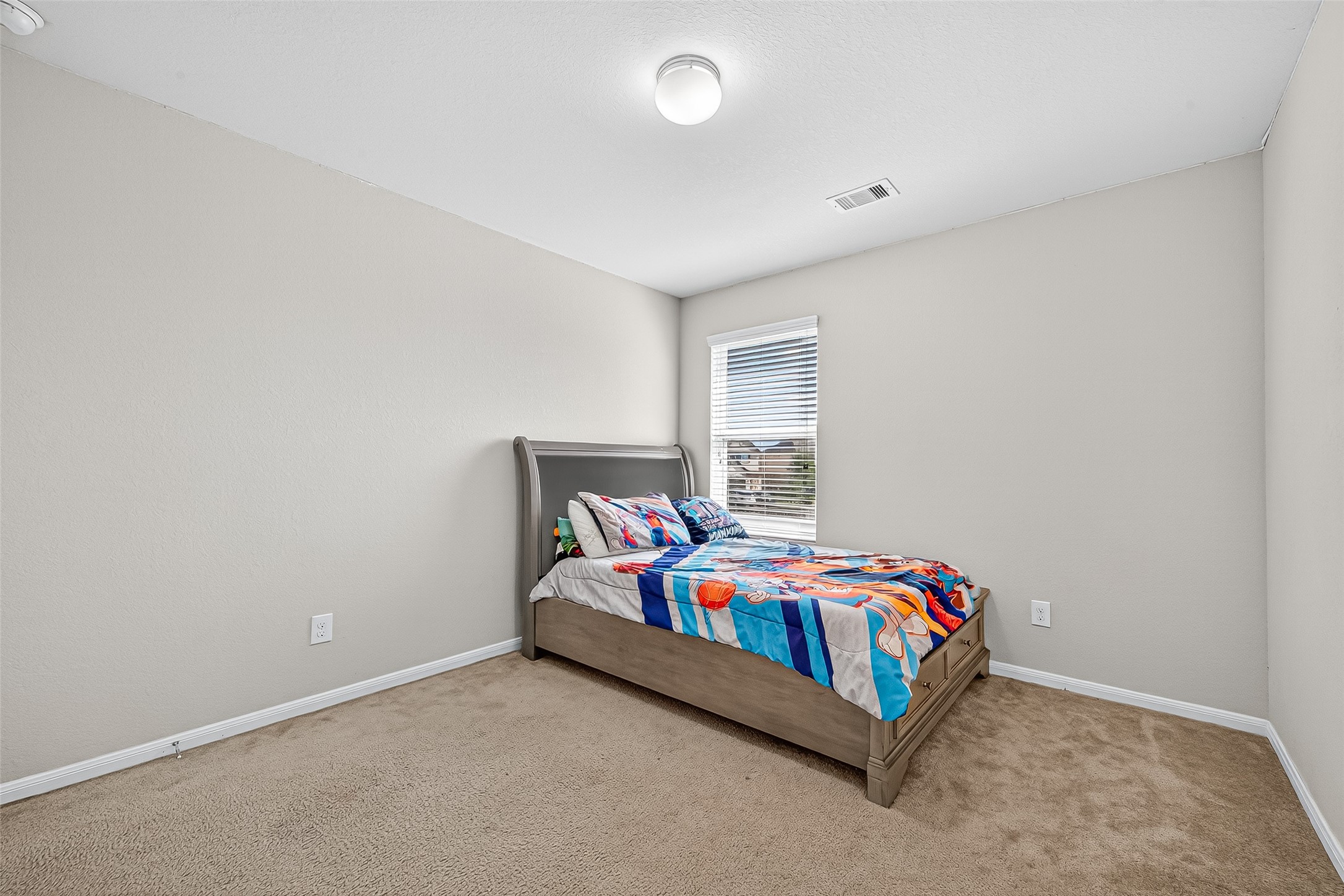 2611 Cottage Step Trail Fresno, TX 77545 - Photo 42 of 48 a bedroom with a bed and window