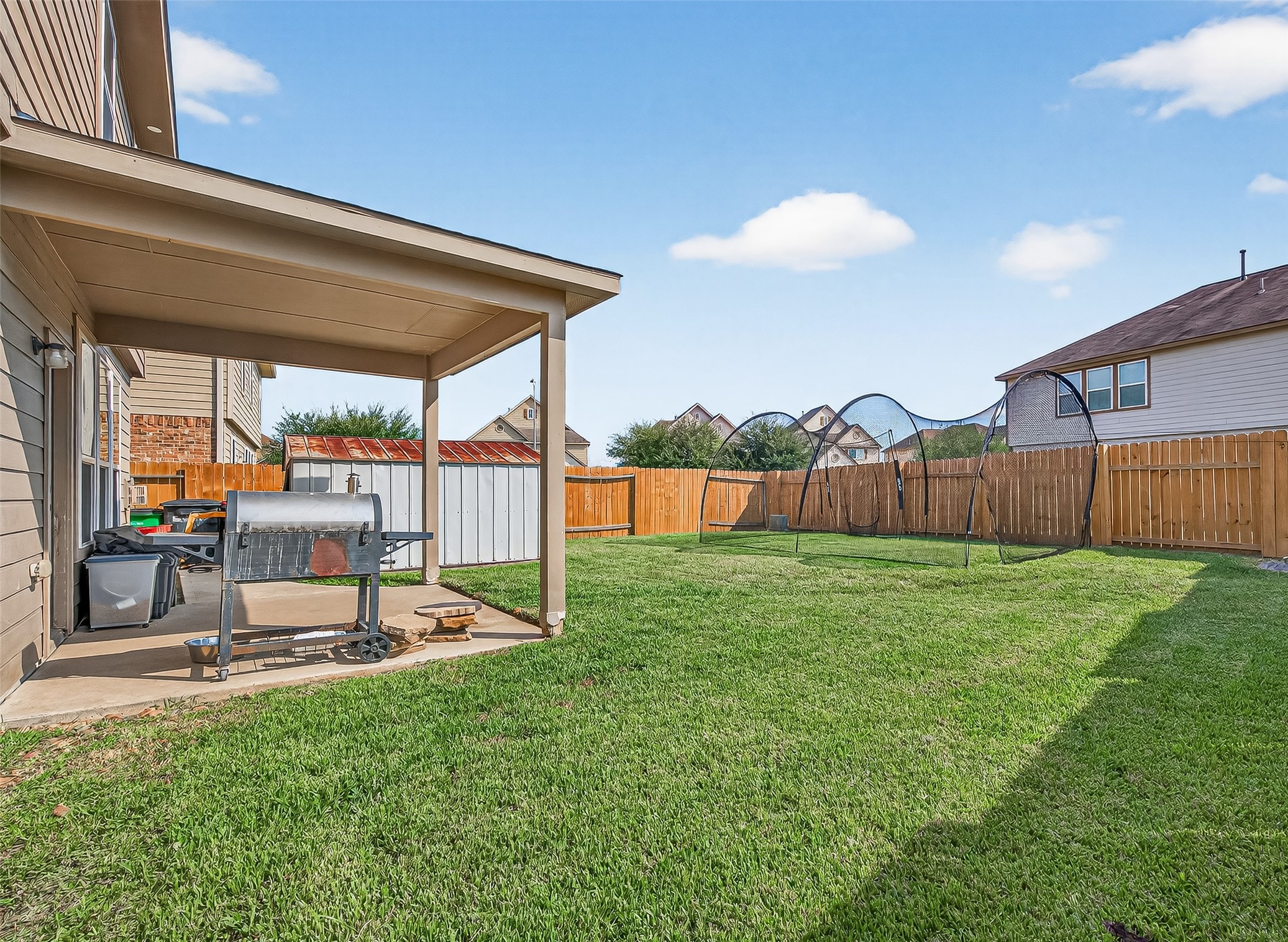 2611 Cottage Step Trail Fresno, TX 77545 - Photo 44 of 48 a view of a backyard with sitting area
