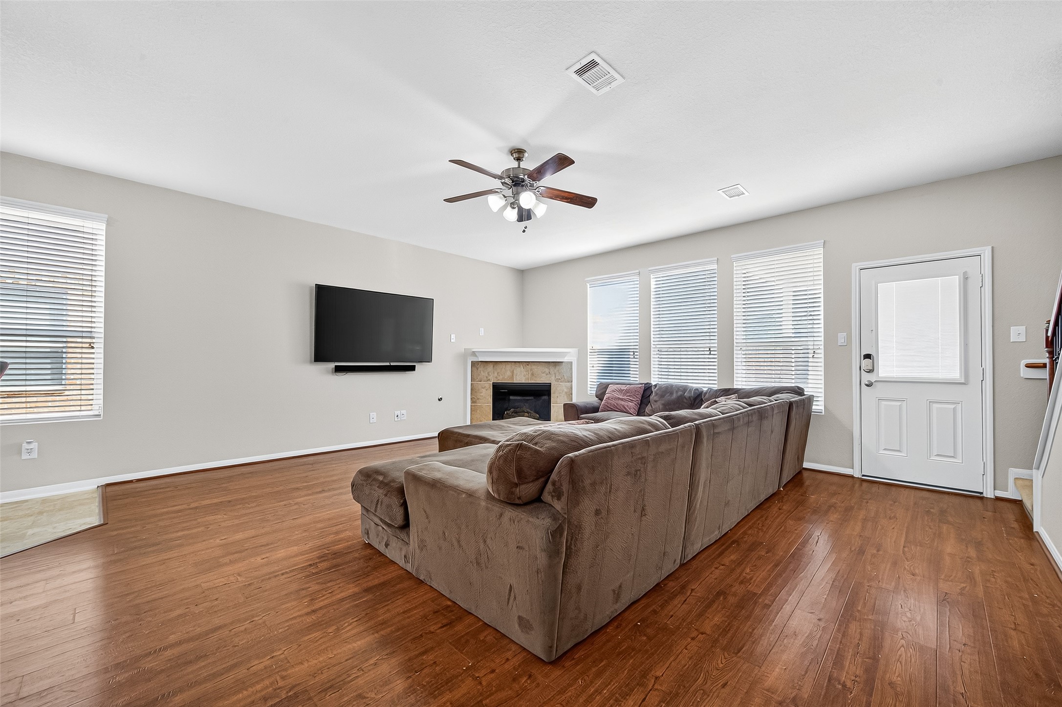 2611 Cottage Step Trail Fresno, TX 77545 - Photo 6 of 48 a living room with furniture fireplace and flat screen tv
